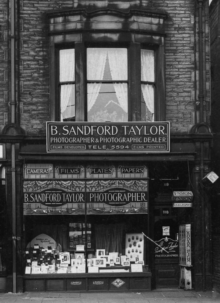 The Belle Vue Studio, also known as Sanford Taylor's, who was its original owner. This high street portrait studio on Manningham Lane in Bradford had many customers who moved to the city to seek work during the 1940s, 50s and 60s. It became very popular amongst newly arrived Asian men, who wanted photographs to send home and who were later joined by their wives and children.